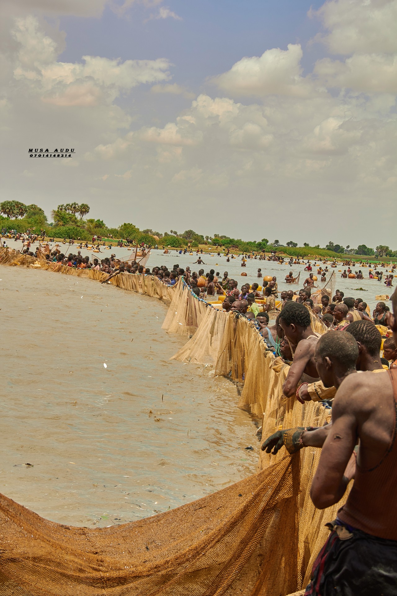 Fishermen in Lake in Sahara Desert. Free Seascapes photos